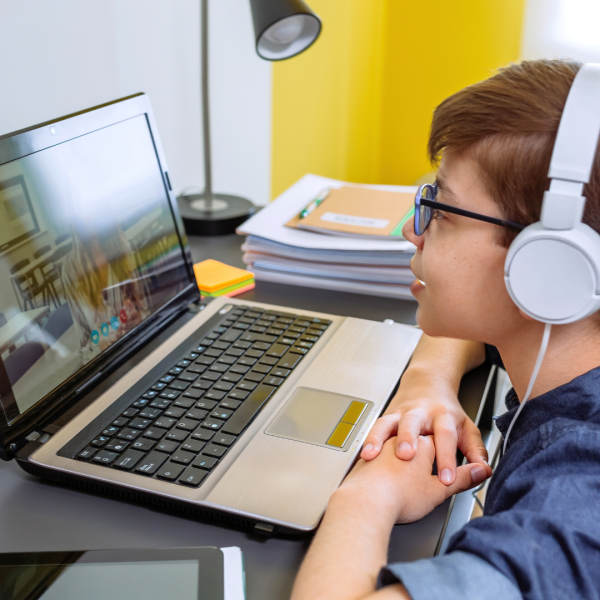 Image of a child working on a computer.